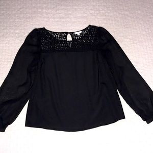 Candie’s black blouse, lace neck & sheer sleeves